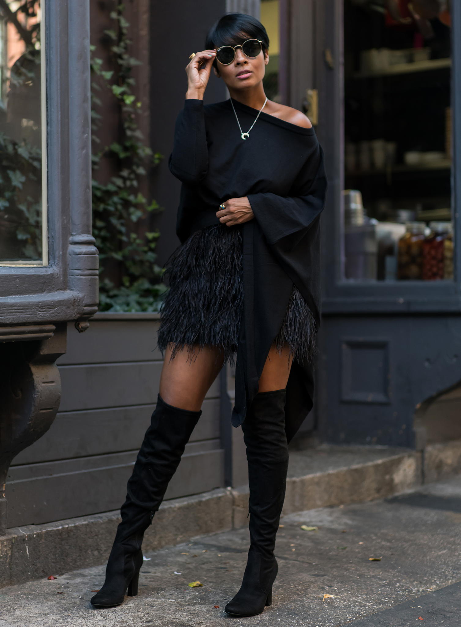 Feather Skirt and Over-the-Knee Boots for Evening Glamour winter outfits for black women