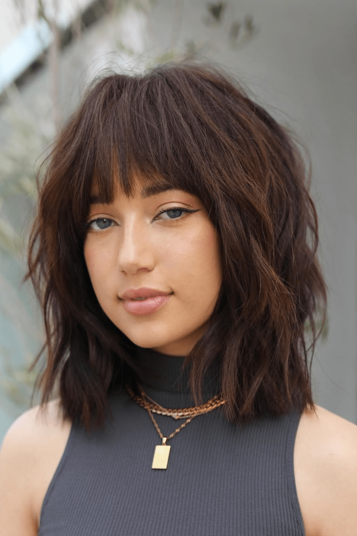 Ear-Length Shag With Blunt Bangs Ear-Length Shag With Blunt Bangs — Winter Shag Haircuts
