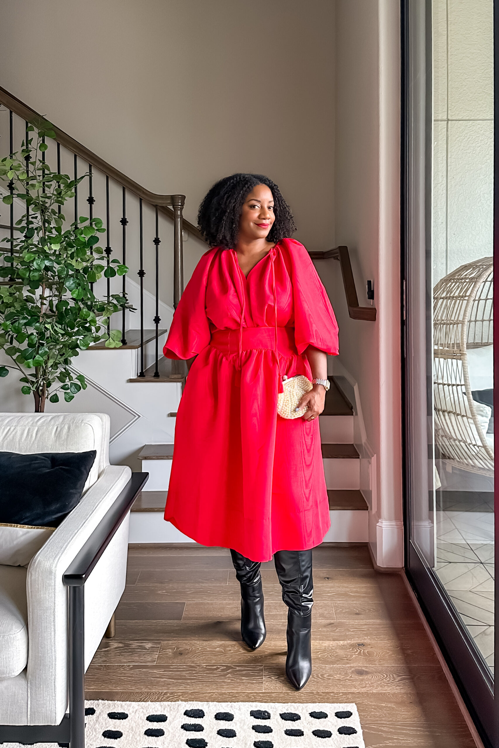 Voluminous Red Dress Paired with Black Pointed-Toe Boots — Black Boots Outfits