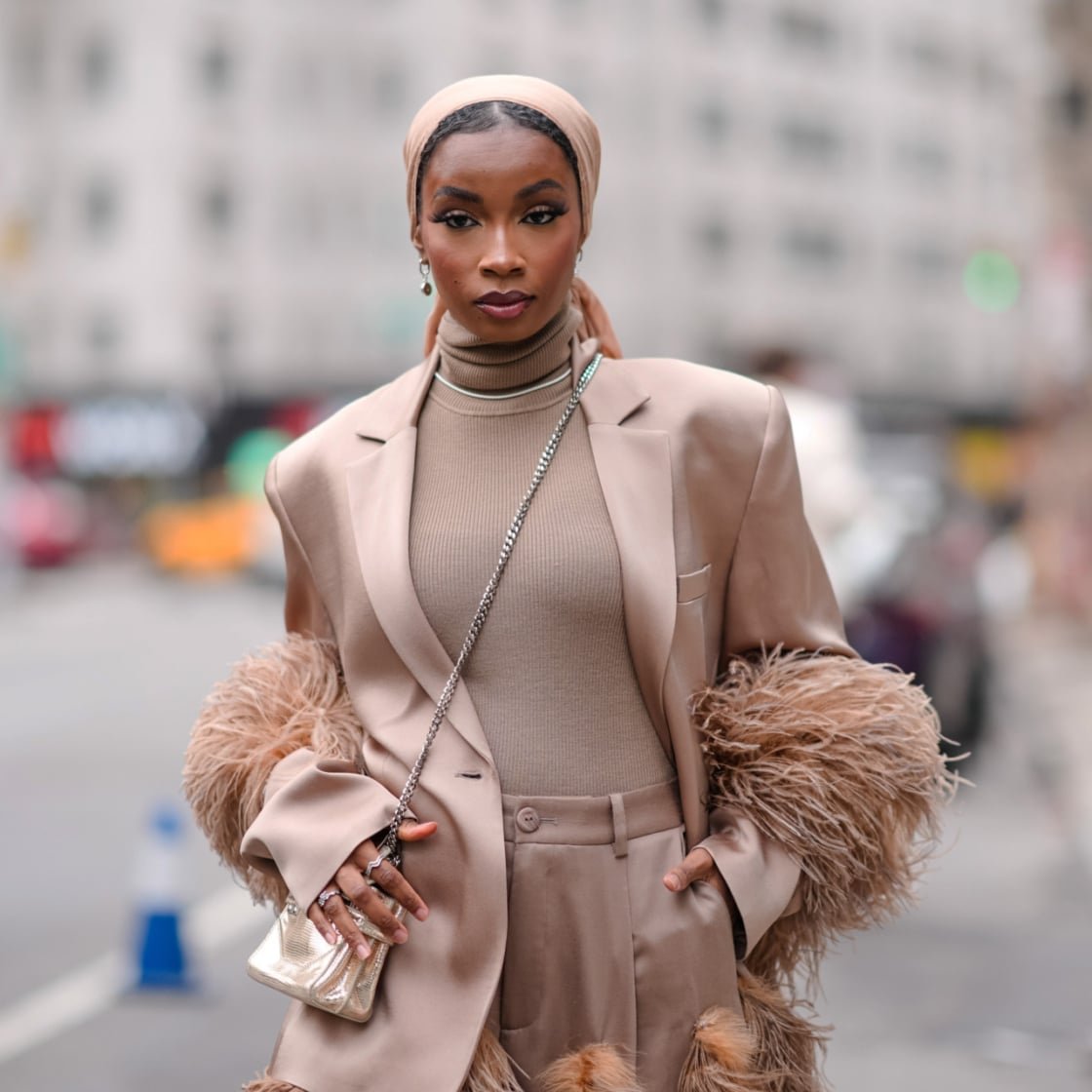Feather-Trimmed Blazer Adds Glamour to Monochrome Set Classy Winter Outfits