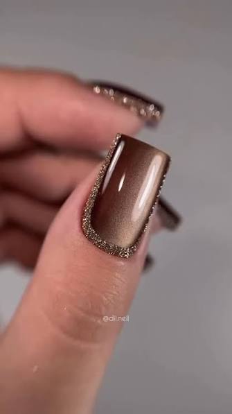 Shimmering Brown Cat-Eye with Gold Glitter Border Shimmering Brown Cat-Eye with Gold Glitter Border — brown nail designs