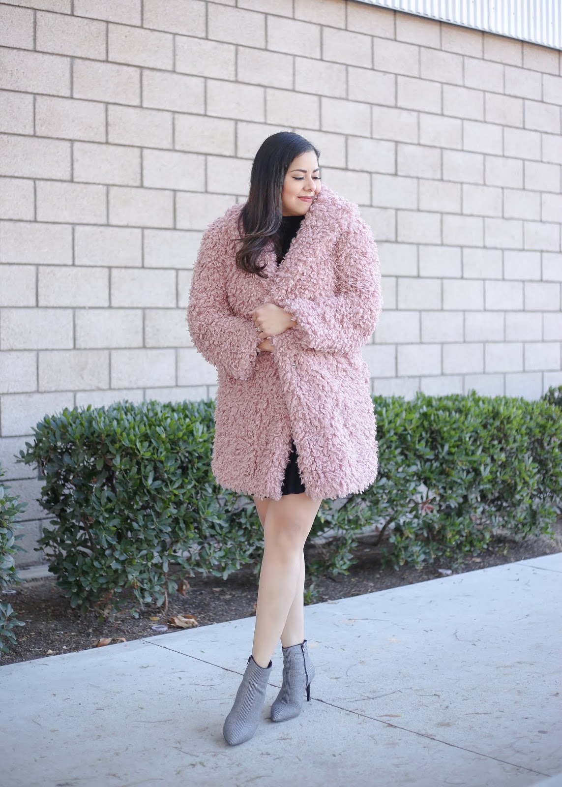 Chic Evening Out: Pink Teddy Coat with Black Mini Dress — Teddy Coat Outfits