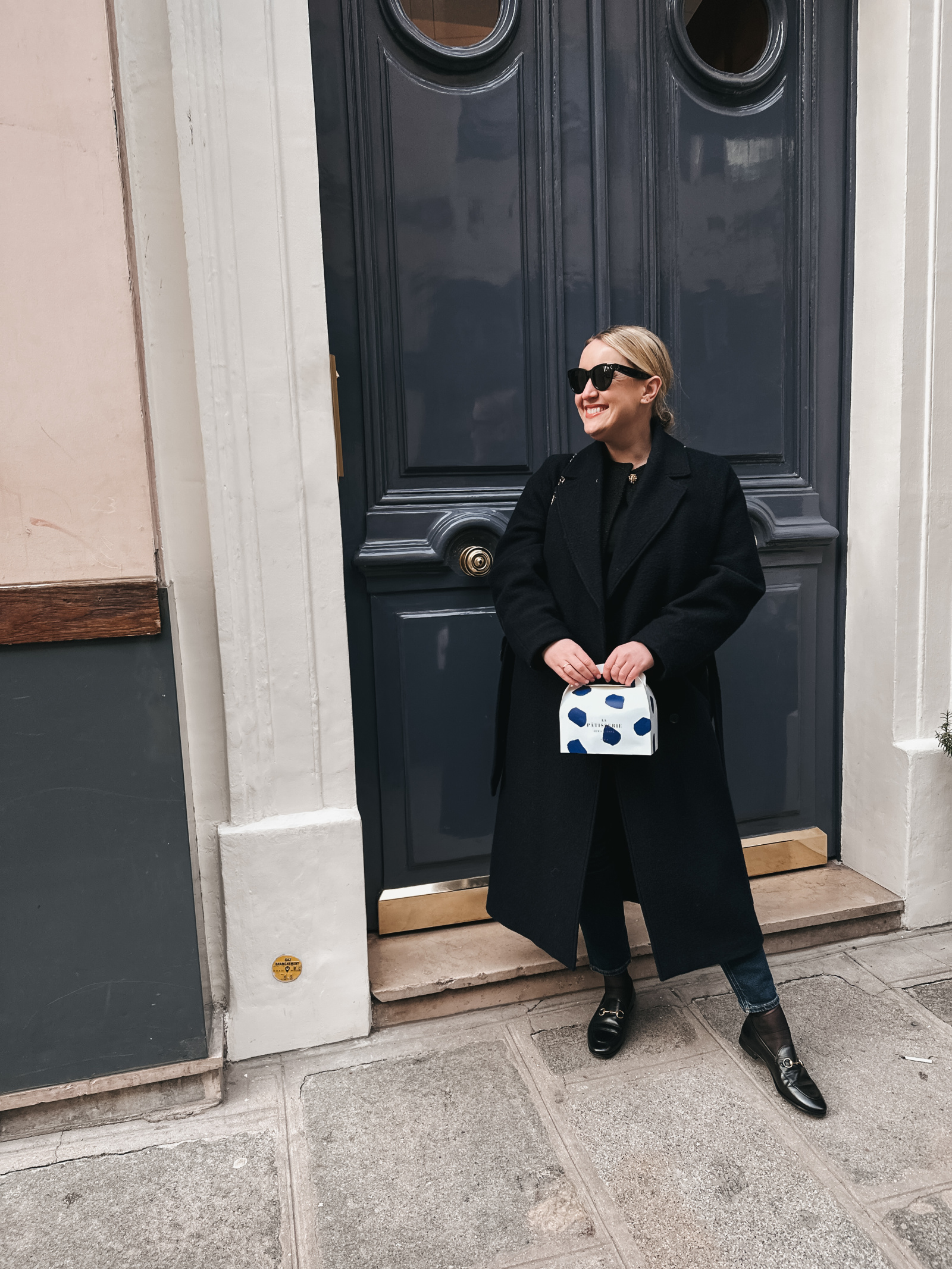Long Black Coat for Timeless Travel Elegance — Winter Travel Outfits