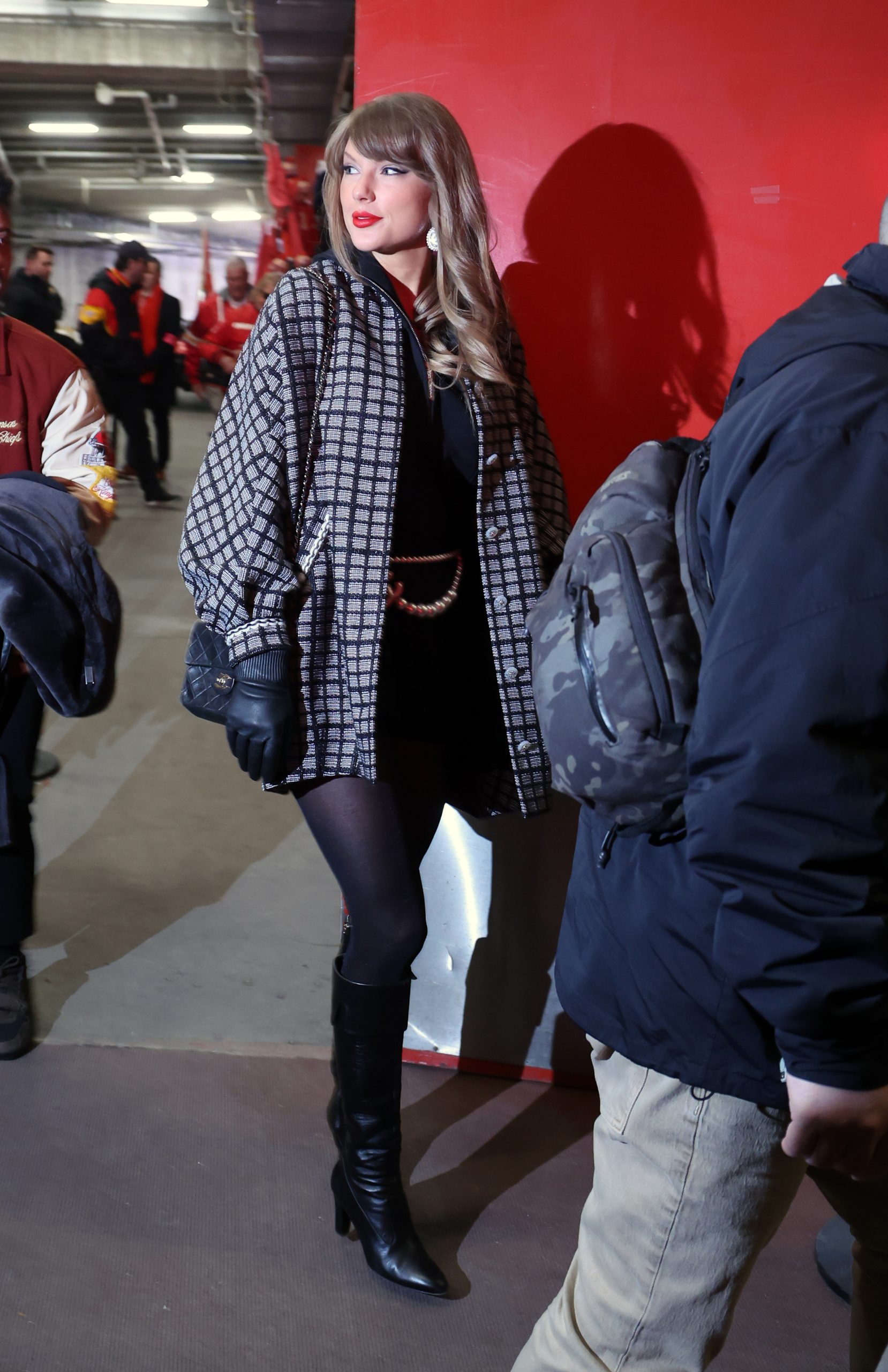 Patterned Jacket Over a Simple Black Dress Patterned Jacket Over a Simple Black Dress — Winter Football Game Outfits