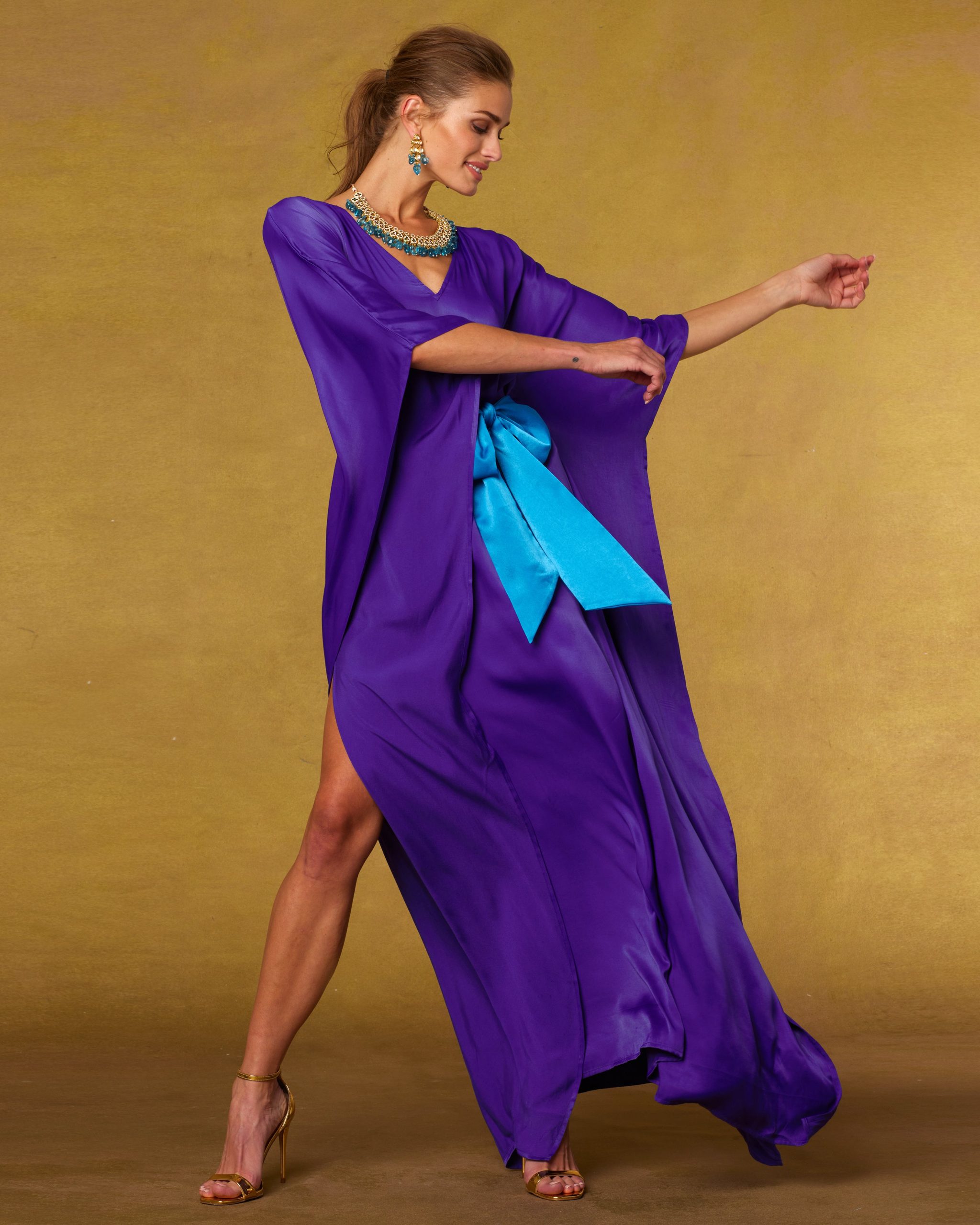 Glamorous Royal Purple Silk Kaftan with Bright Blue Sash and Gold Stilettos Glamorous Royal Purple Silk Kaftan with Bright Blue Sash and Gold Stilettos — Royal Purple Outfits