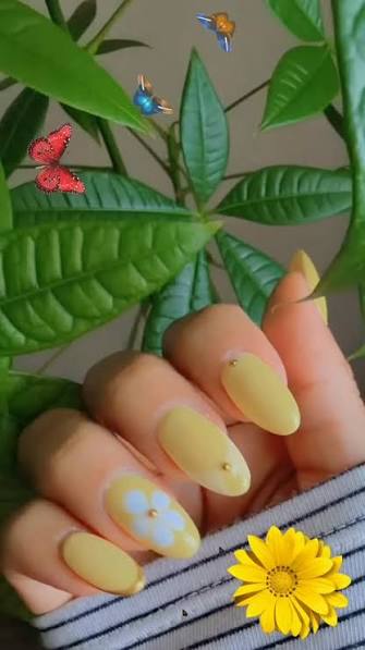 Pale Yellow with White Flower Design Pale Yellow with White Flower Design — yellow nail designs