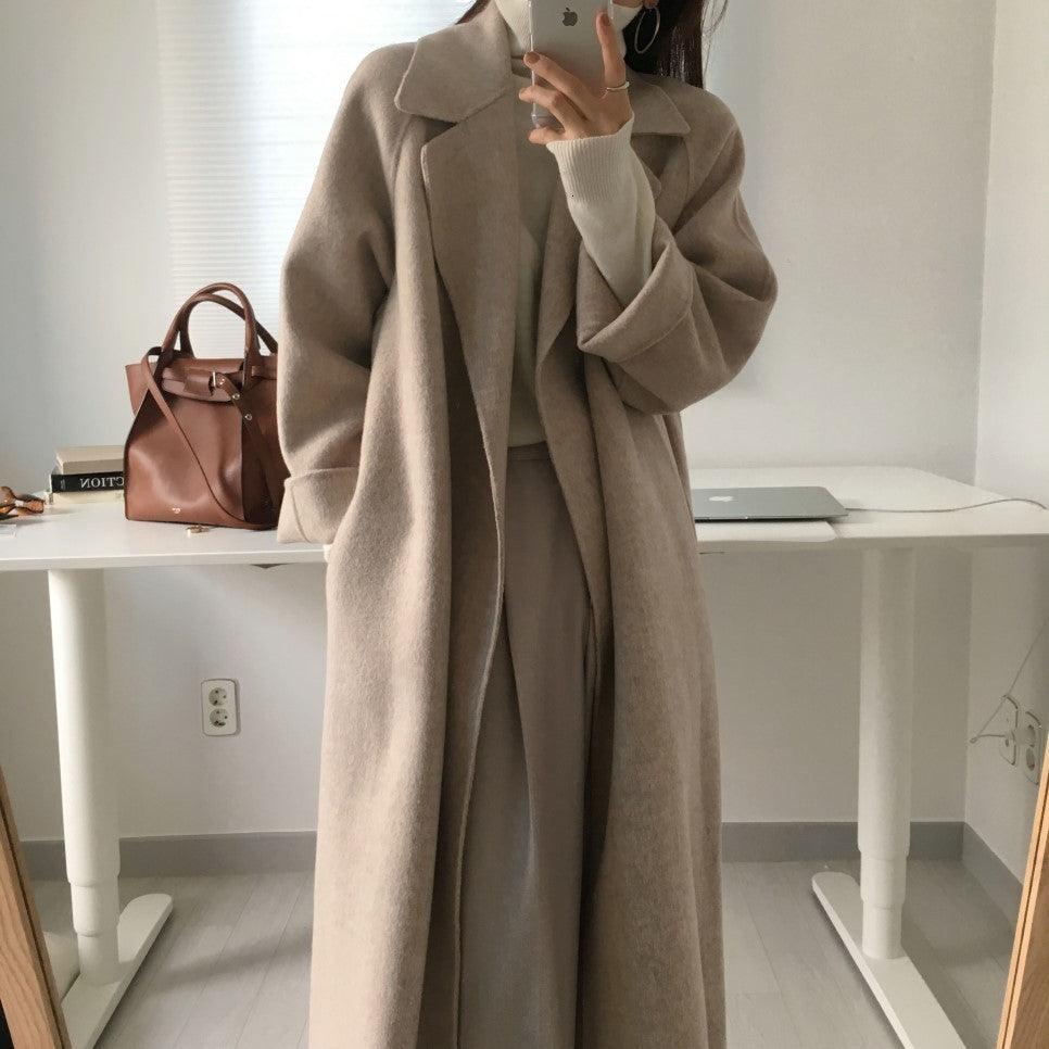 Streamlined Sophistication: Long Beige Coat and Grey Trousers — Minimalist Winter Outfits