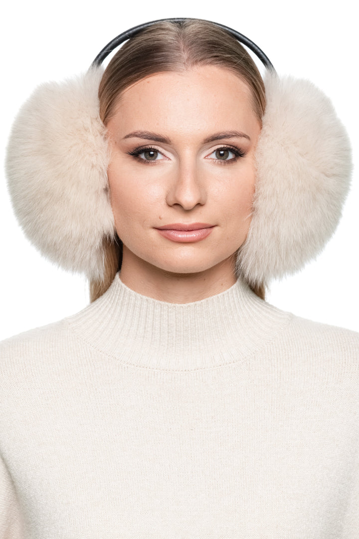 Luxurious Texture: Cream Fox Fur Earmuffs with Knit Sweater Luxurious Texture: Cream Fox Fur Earmuffs with Knit Sweater — Earmuffs Outfits