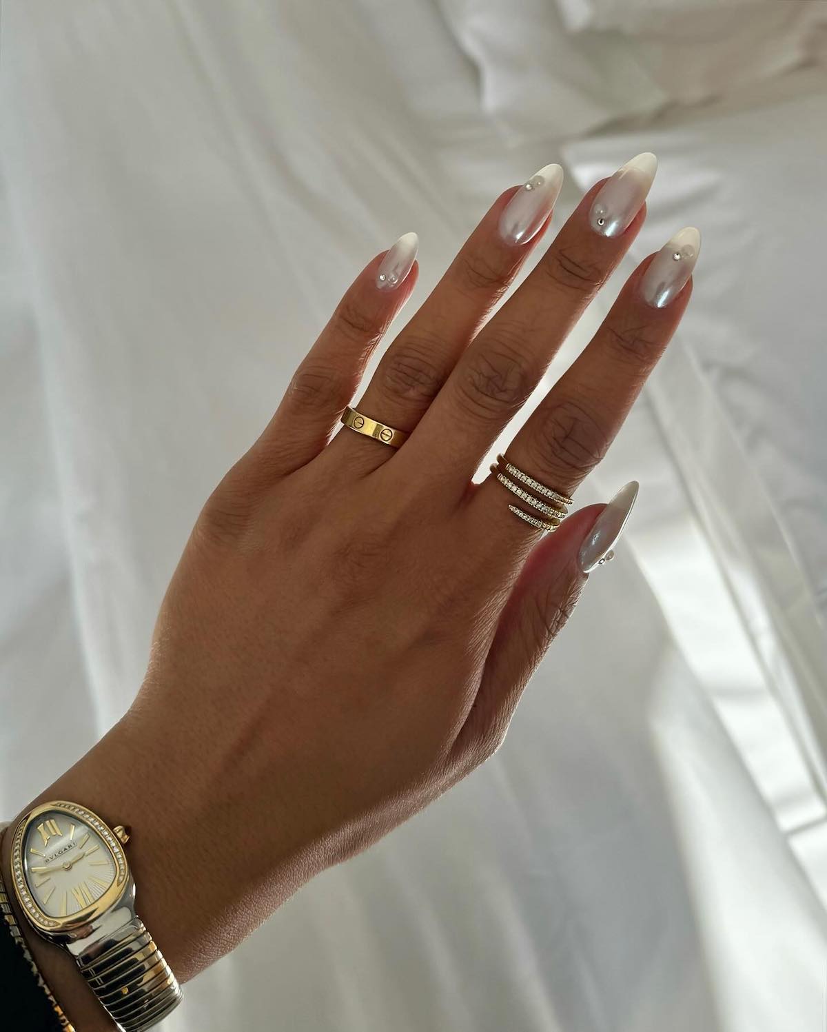Pearlescent White Pearl Rhinestone Stiletto Nails Pearlescent White Pearl Rhinestone Stiletto Nails — Winter Wedding Nails