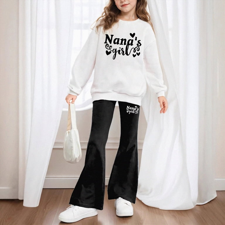 Graphic Sweatshirt with Black Flared Pants Graphic Sweatshirt with Black Flared Pants — Winter School Outfits