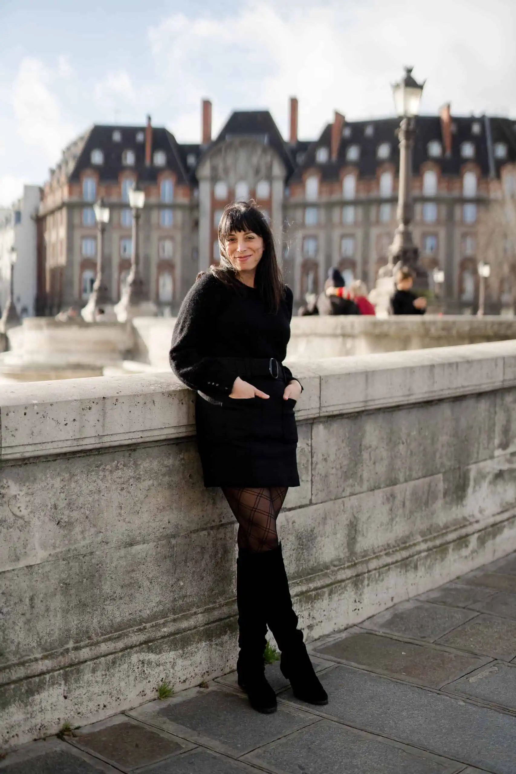 Black Knit Dress with Patterned Tights for a Textured Dinner Look — Winter Dinner Outfits