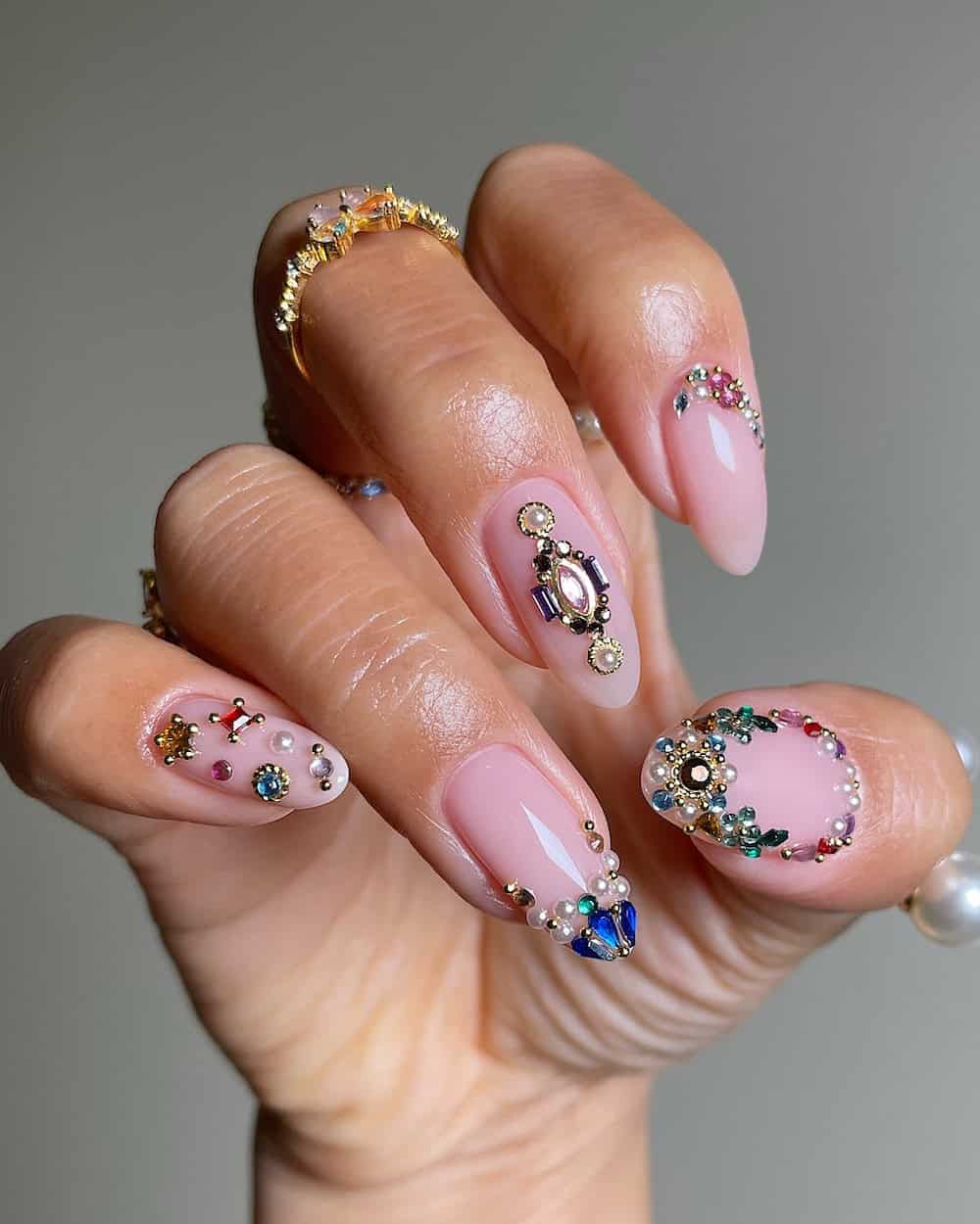Rhinestone and Pearl Embellished Oval Nails Rhinestone and Pearl Embellished Oval Nails — Cute Winter Nails