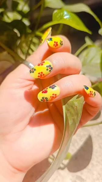 Bright Yellow with Red and Blue Flowers Bright Yellow with Red and Blue Flowers — yellow nail designs