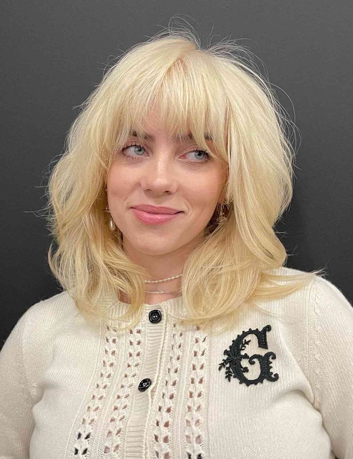Shoulder Shag Ash Blonde Shoulder Shag Ash Blonde — Winter Haircuts with Curtain Bangs