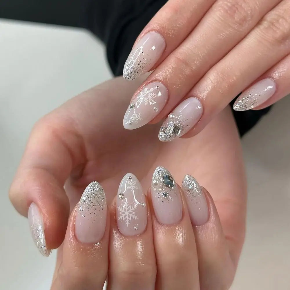 Shimmering Nude with Pearls and Snowflakes Shimmering Nude with Pearls and Snowflakes — Winter Wonderland Nails
