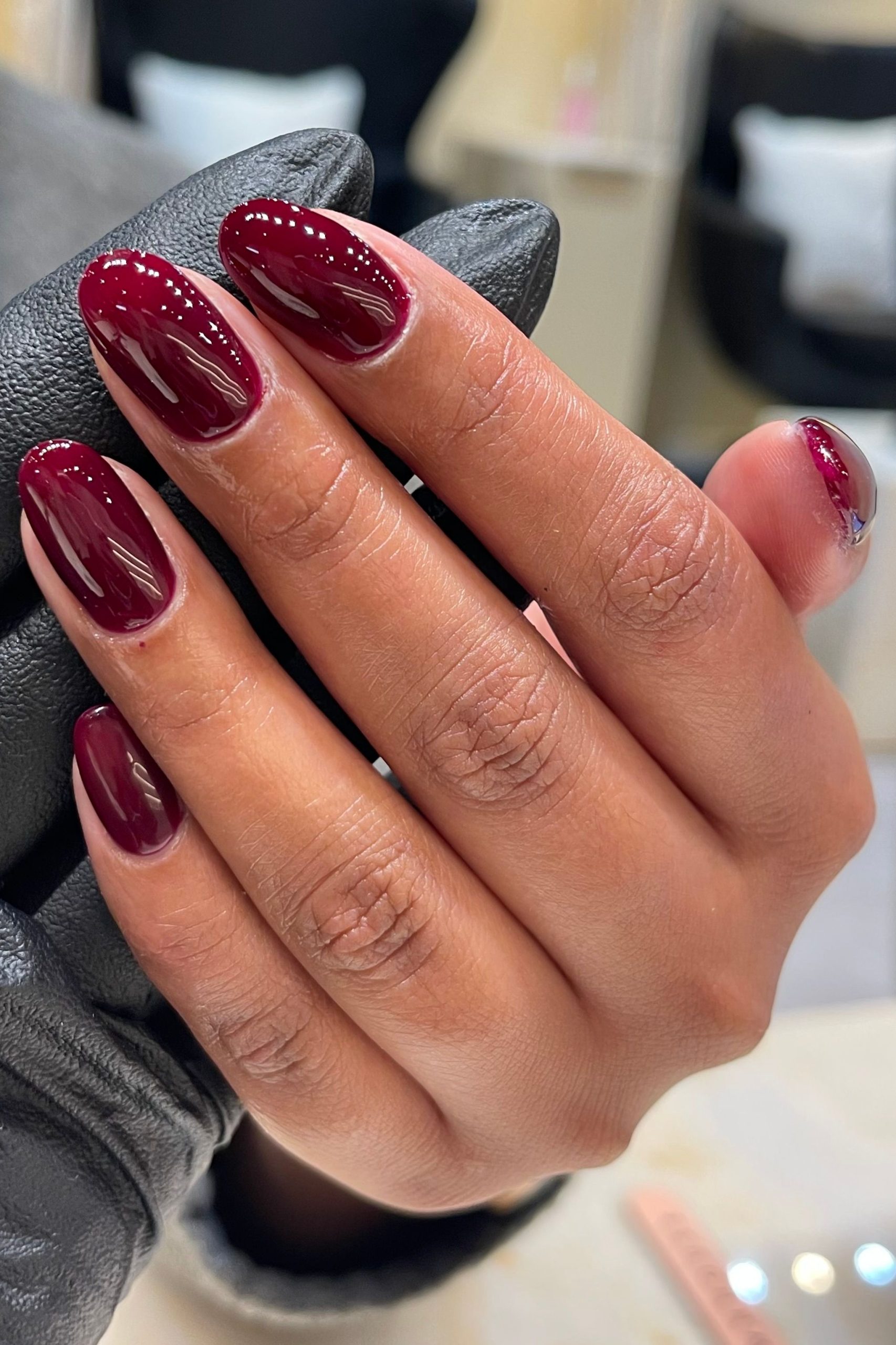 Deep Burgundy Glossy Medium Almonds Deep Burgundy Glossy Medium Almonds — Short Winter Almond Nails