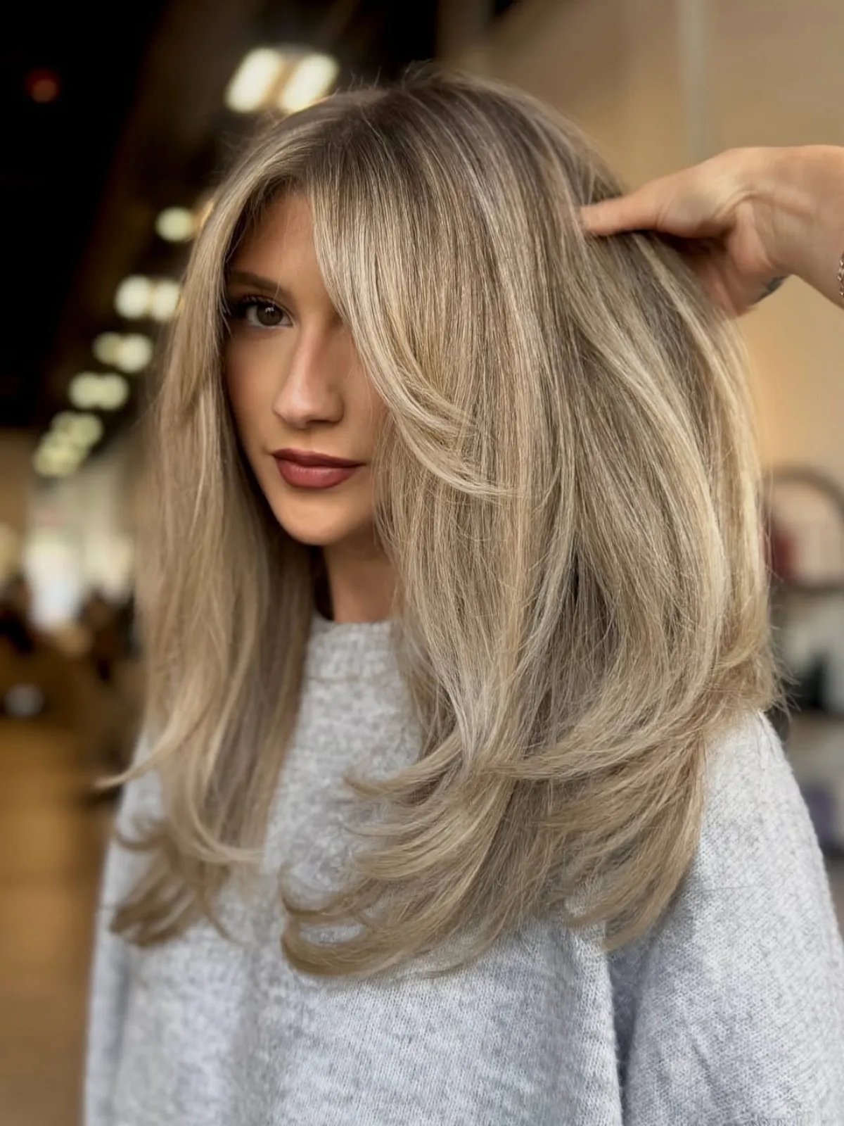 Beige Blonde Layered Blowout Beige Blonde Layered Blowout — Winter Hair Colors for Blondes