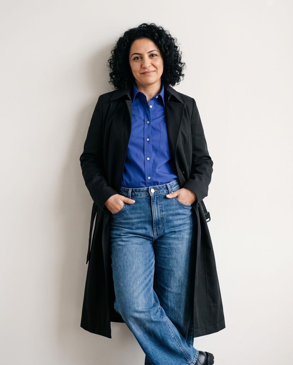 Striking Contrast: Black Trench with Blue Shirt — Black Coat Outfits