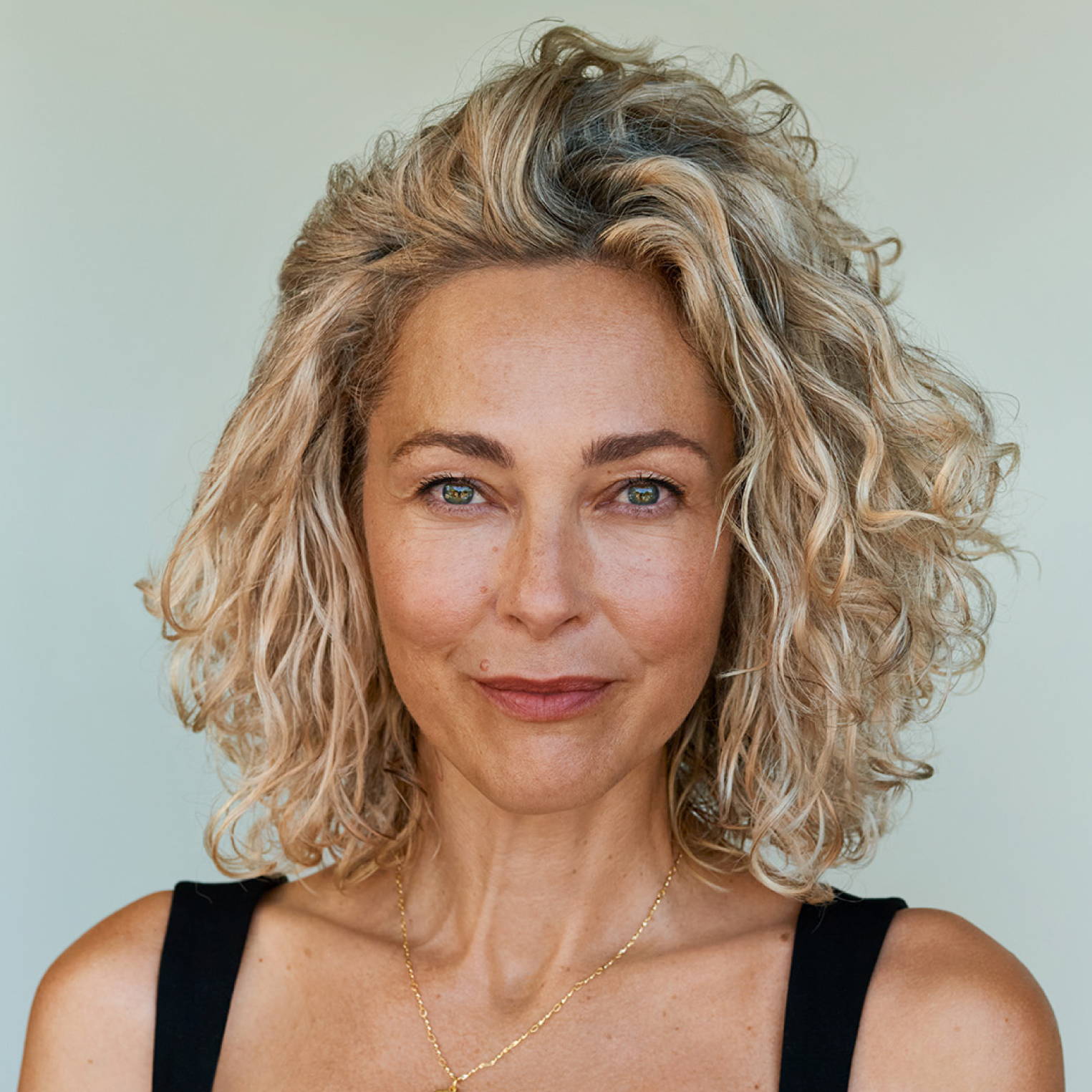 Textured Ash Blonde Bob With Side Bangs — Winter Hair Colors for Women Over 60