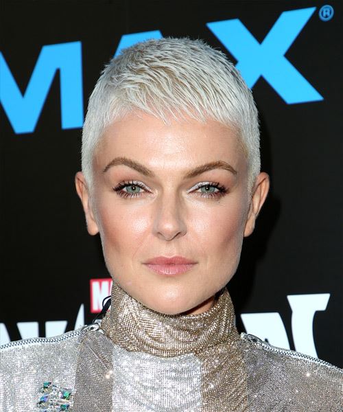 Edgy Platinum Blonde Pixie With Textured Bangs Edgy Platinum Blonde Pixie With Textured Bangs — Winter Pixie Haircuts