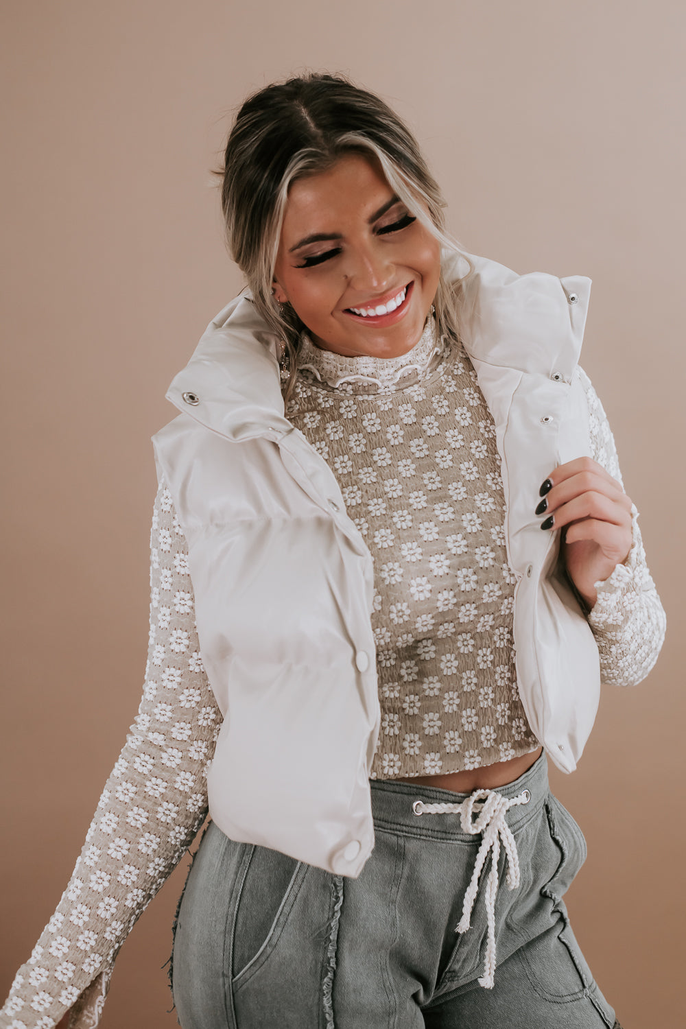 Cream Puffer Vest with Floral Top and Olive Pants — Puffer Vest Outfits