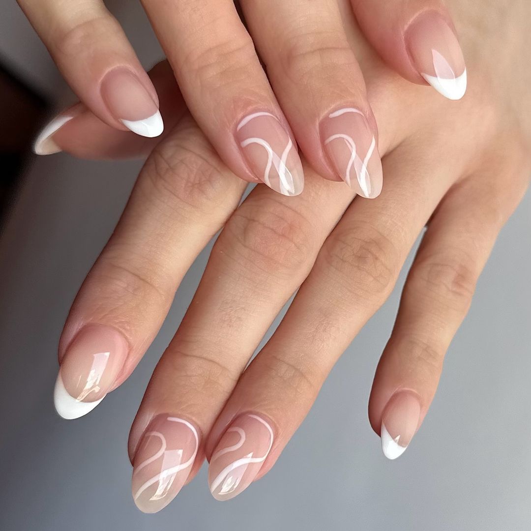 Medium Oval Nude Abstract Swirls French Medium Oval Nude Abstract Swirls French — Winter White Nails