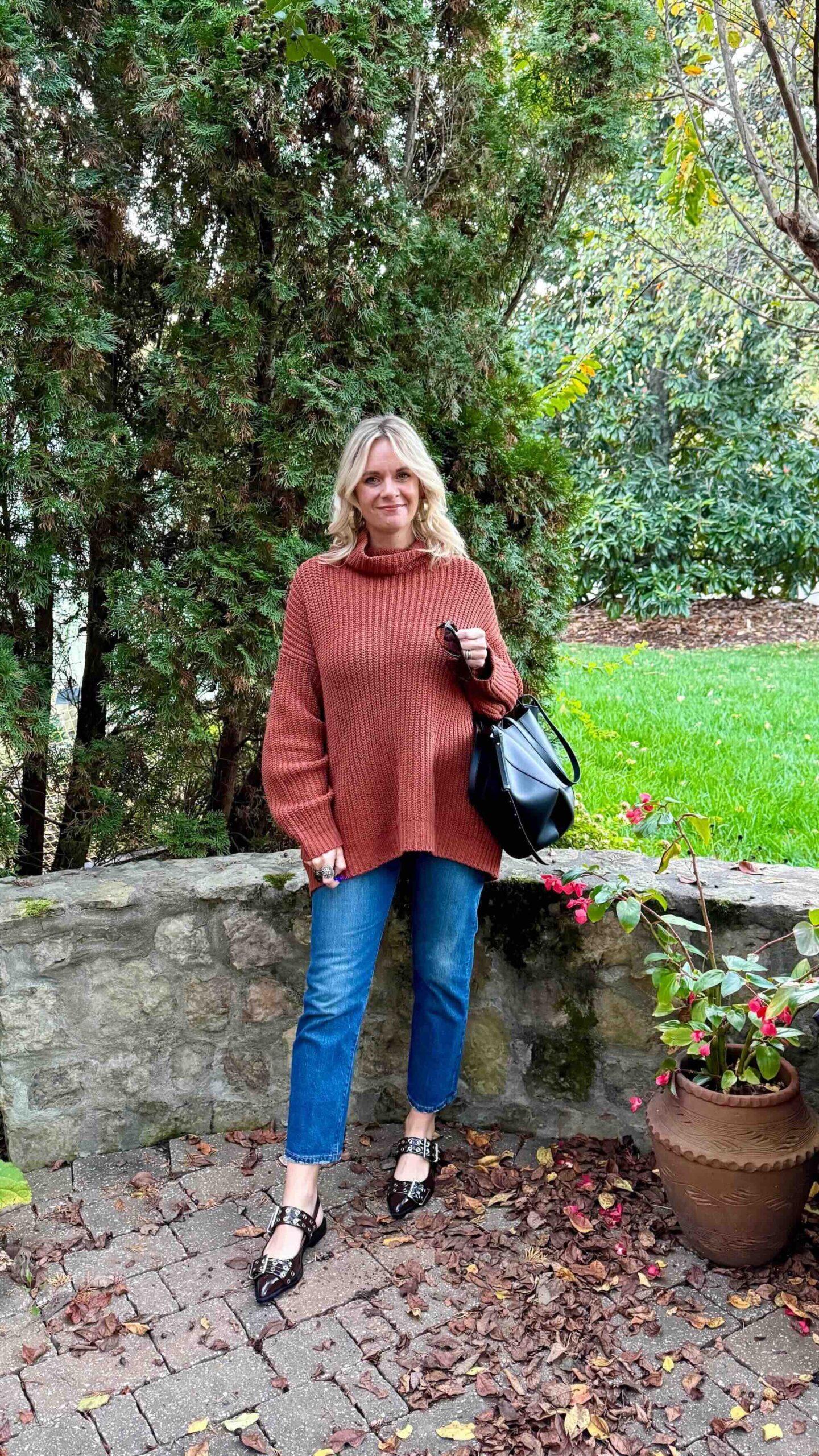 Rust Oversized Turtleneck with Blue Jeans and Embellished Loafers — Turtleneck Outfits