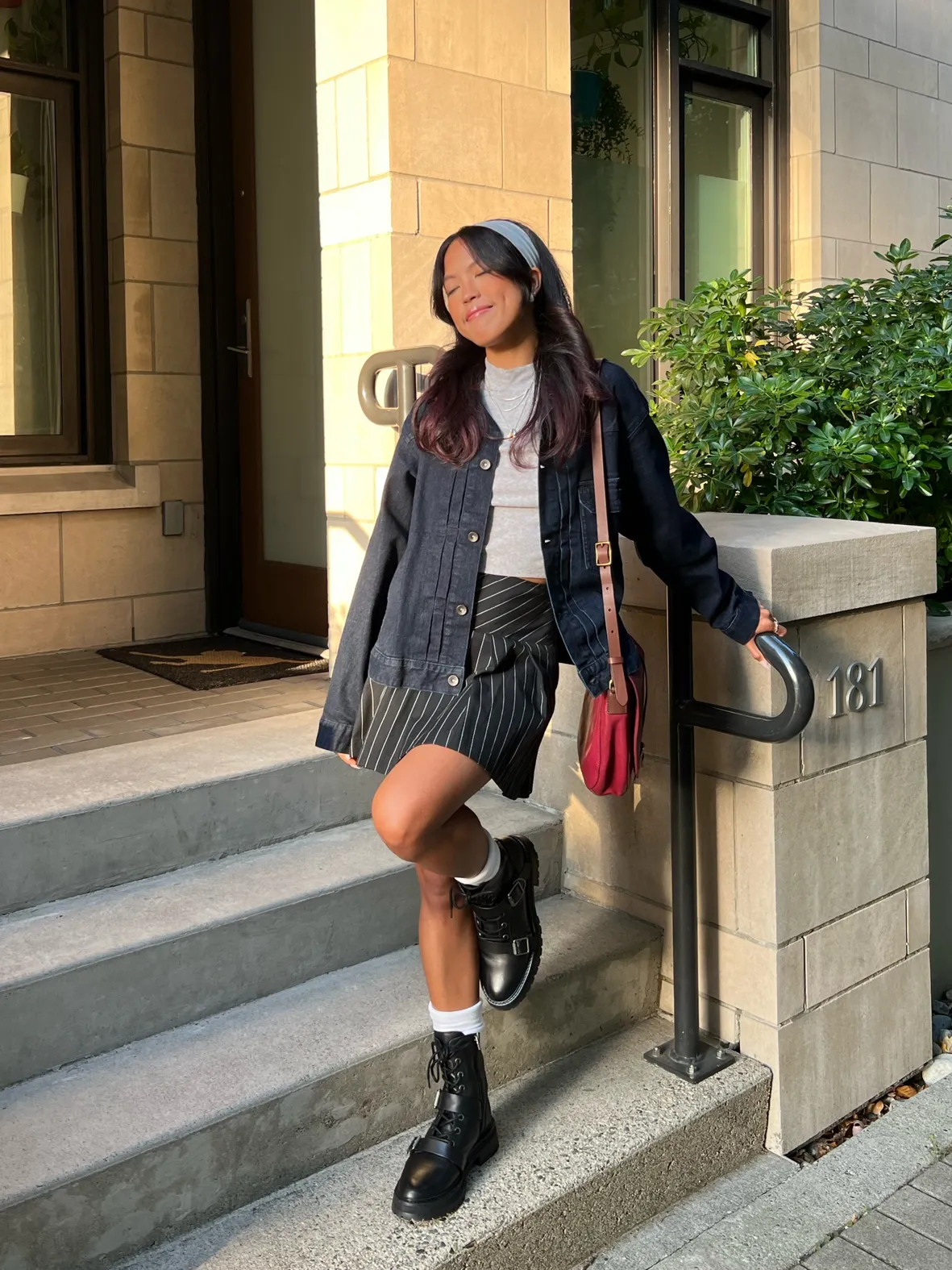 Playful Casual with Pinstripe Skirt and Red Bag Playful Casual with Pinstripe Skirt and Red Bag — Combat Boots Outfits
