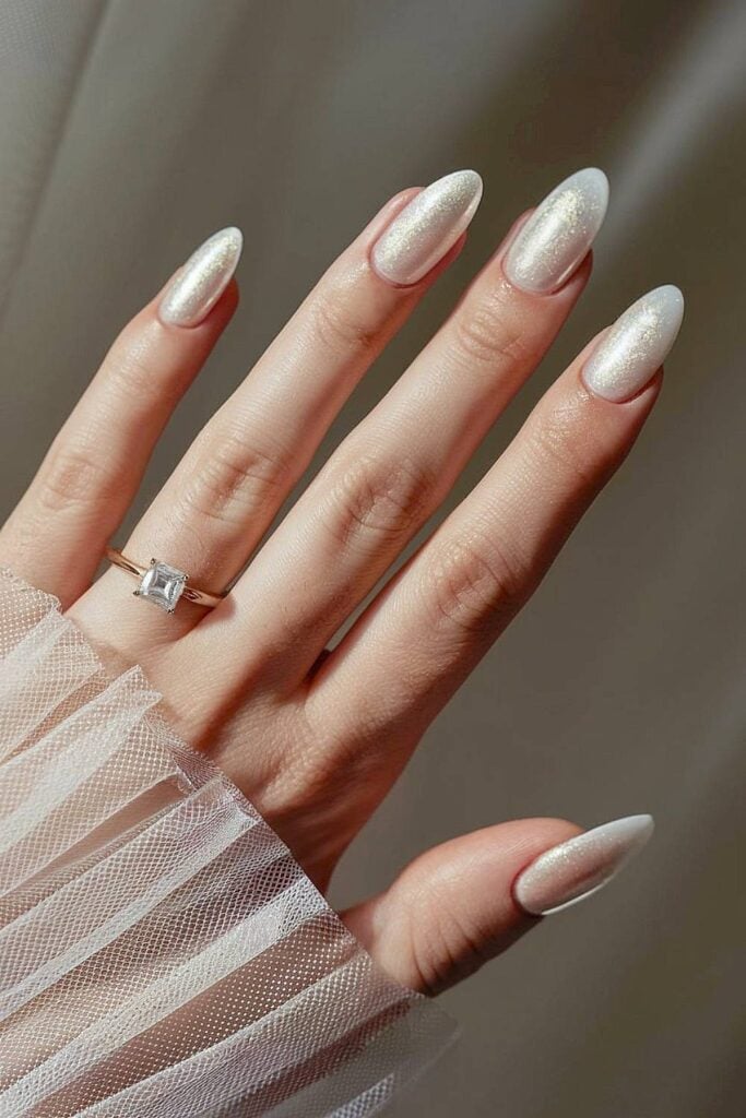 Champagne Pearlescent Shimmer Stiletto Nails Champagne Pearlescent Shimmer Stiletto Nails — Winter Wedding Nails