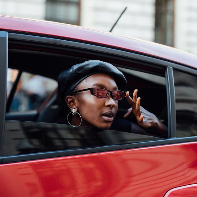 Black Leather Beret and Top Framed by a Red Car Black Leather Beret and Top Framed by a Red Car — Beret Outfits