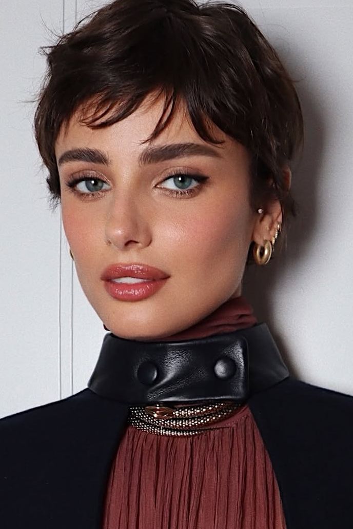 Tousled Dark Brown Pixie with Wispy Bangs Tousled Dark Brown Pixie with Wispy Bangs — very short women haircuts