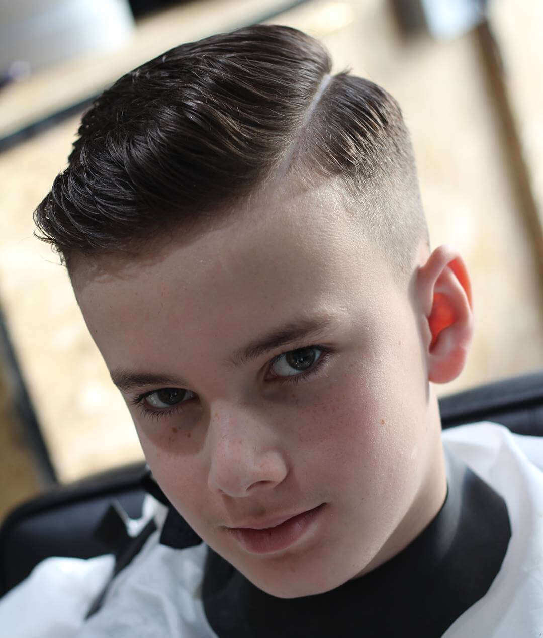 Short On Sides Longer On Top Taper Fade With Hard Part Short On Sides Longer On Top Taper Fade With Hard Part — Winter Haircuts for Boys