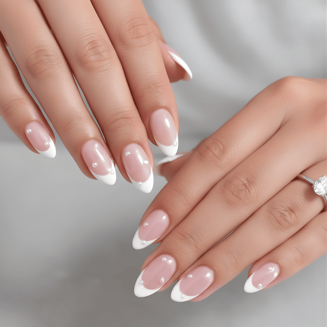 Elegant Pearl Embellished French Almond Nails Elegant Pearl Embellished French Almond Nails — Natural Winter Nails