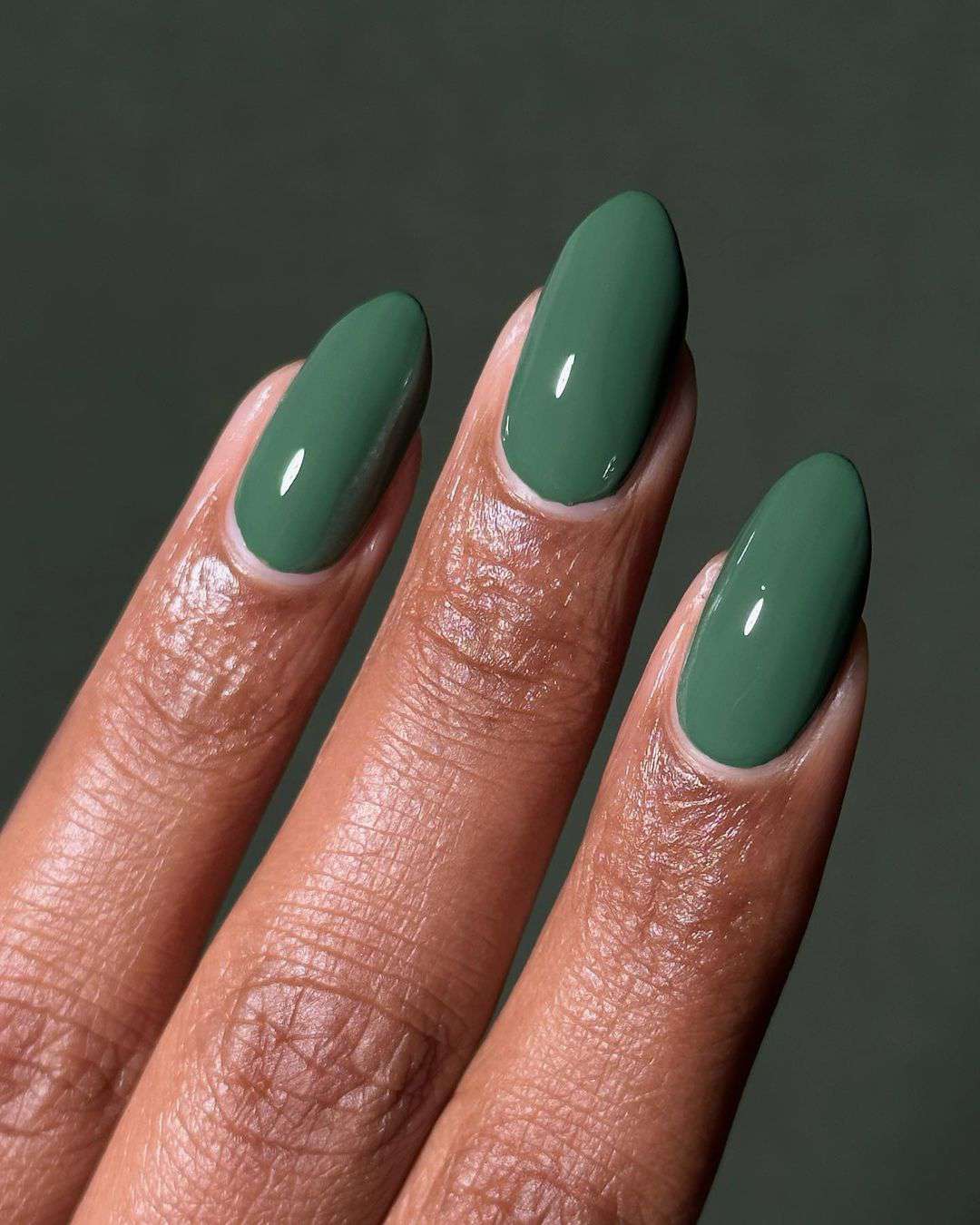 Deep Forest Green Glossy Medium Oval Nails Deep Forest Green Glossy Medium Oval Nails — Winter Nail Colors for Dark Skin