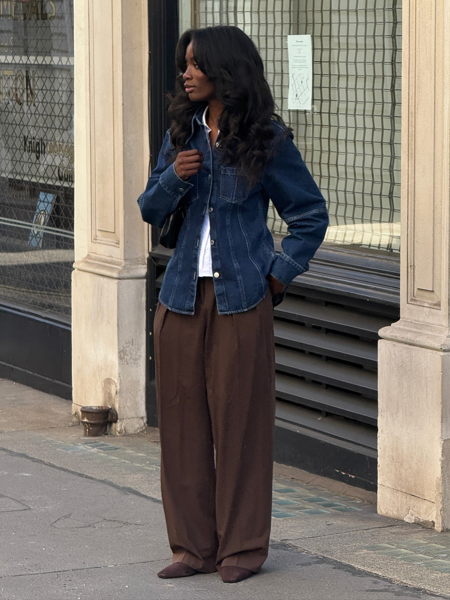 Denim Jacket Over White Shirt and Brown Trousers — Winter to Spring Transition Outfits