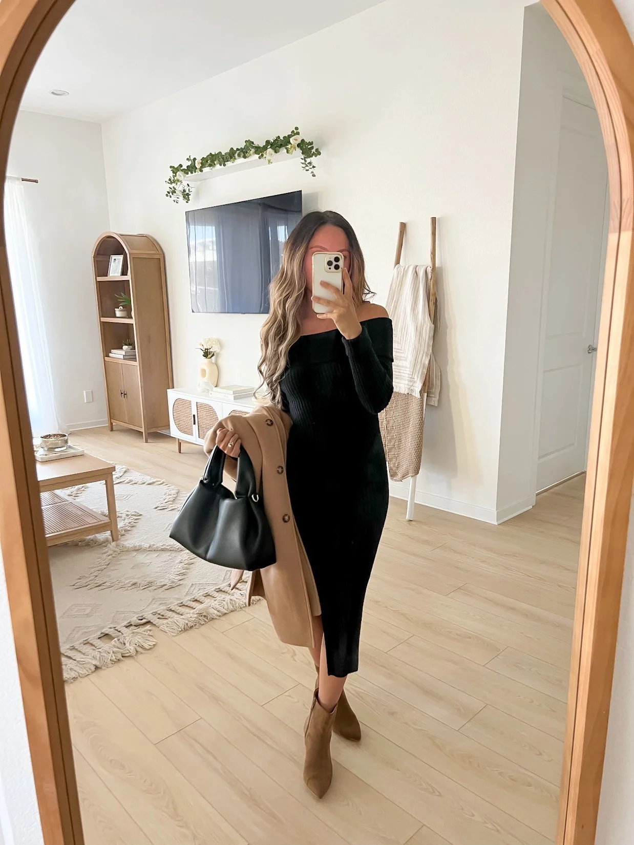 Black Off-the-Shoulder Knit Dress with Camel Coat for Evening Sophistication — Winter Dinner Outfits