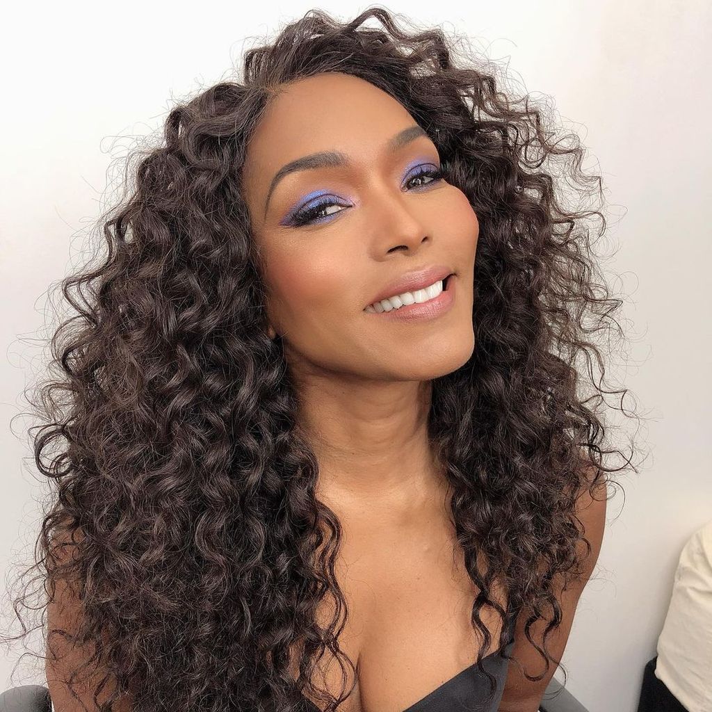 Mid-Back Defined Loose Curls Mid-Back Defined Loose Curls — Winter Haircuts for Black Women