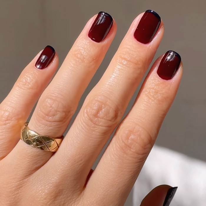 Oxblood Red with Navy Blue French Tip Oxblood Red with Navy Blue French Tip — Winter Nail Colors for Pale Skin