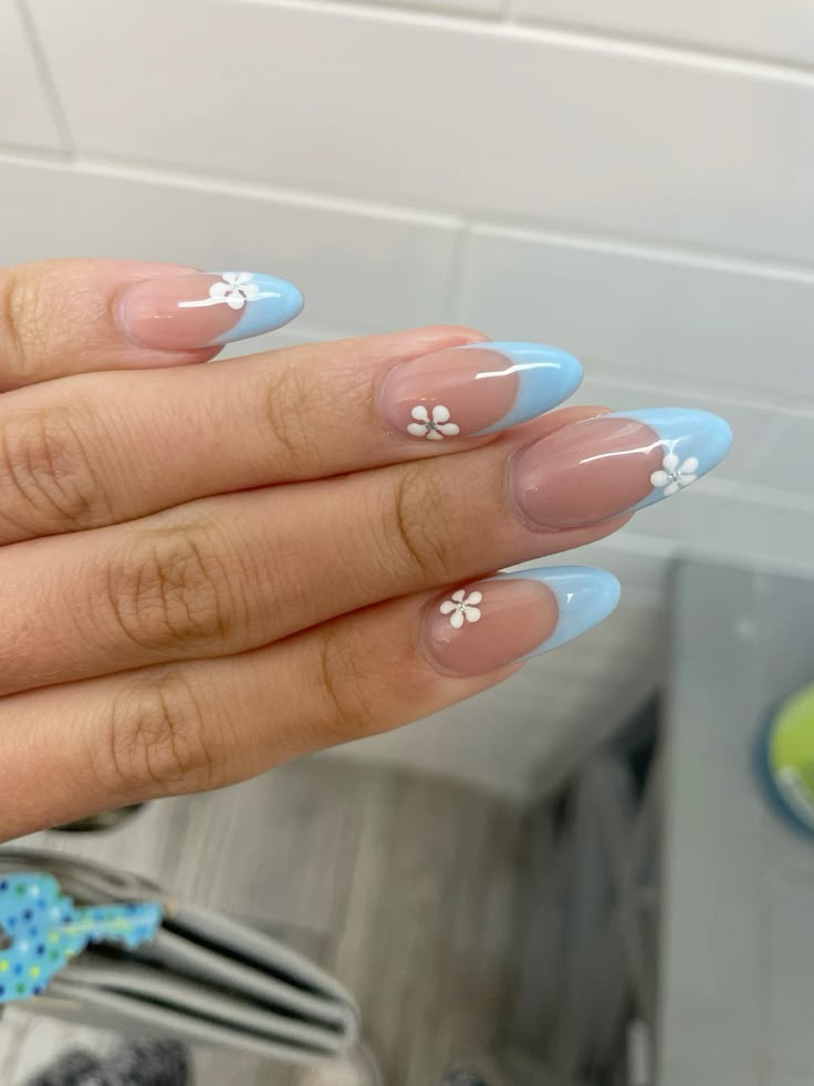 Light Blue French Tips with Flower Decals Light Blue French Tips with Flower Decals — french nail designs