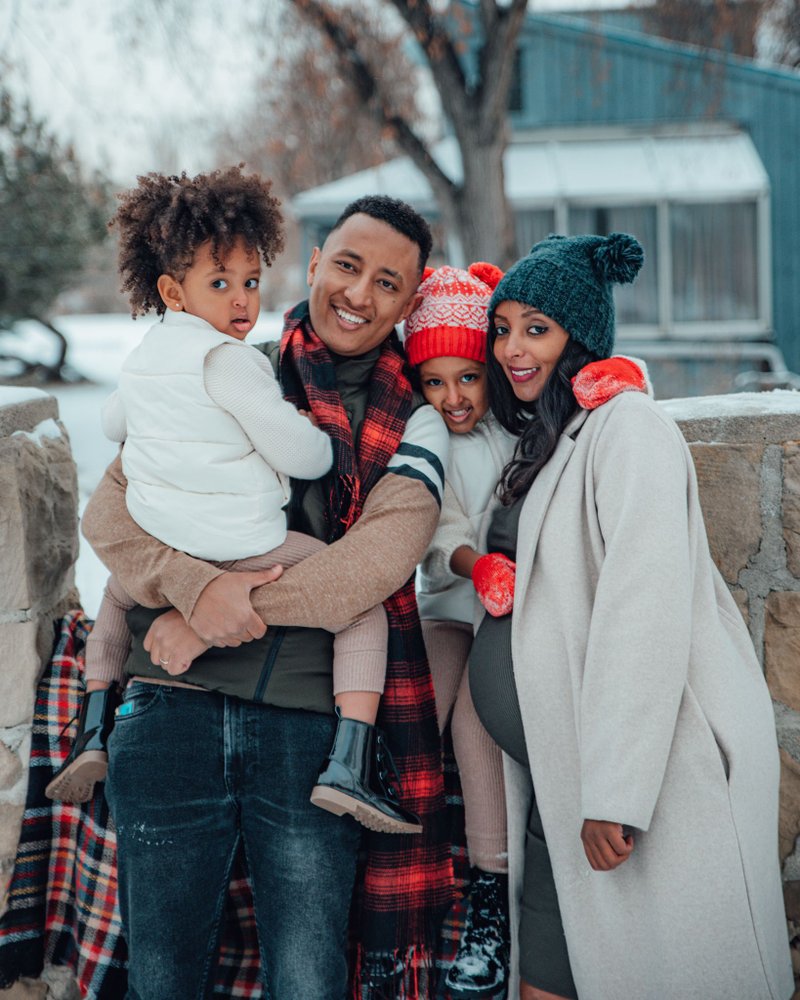 Cream Puffer Coat and Dark Green Layers for a Chic Winter Family Portrait Cream Puffer Coat and Dark Green Layers for a Chic Winter Family Portrait — Winter Family Photo Outfits