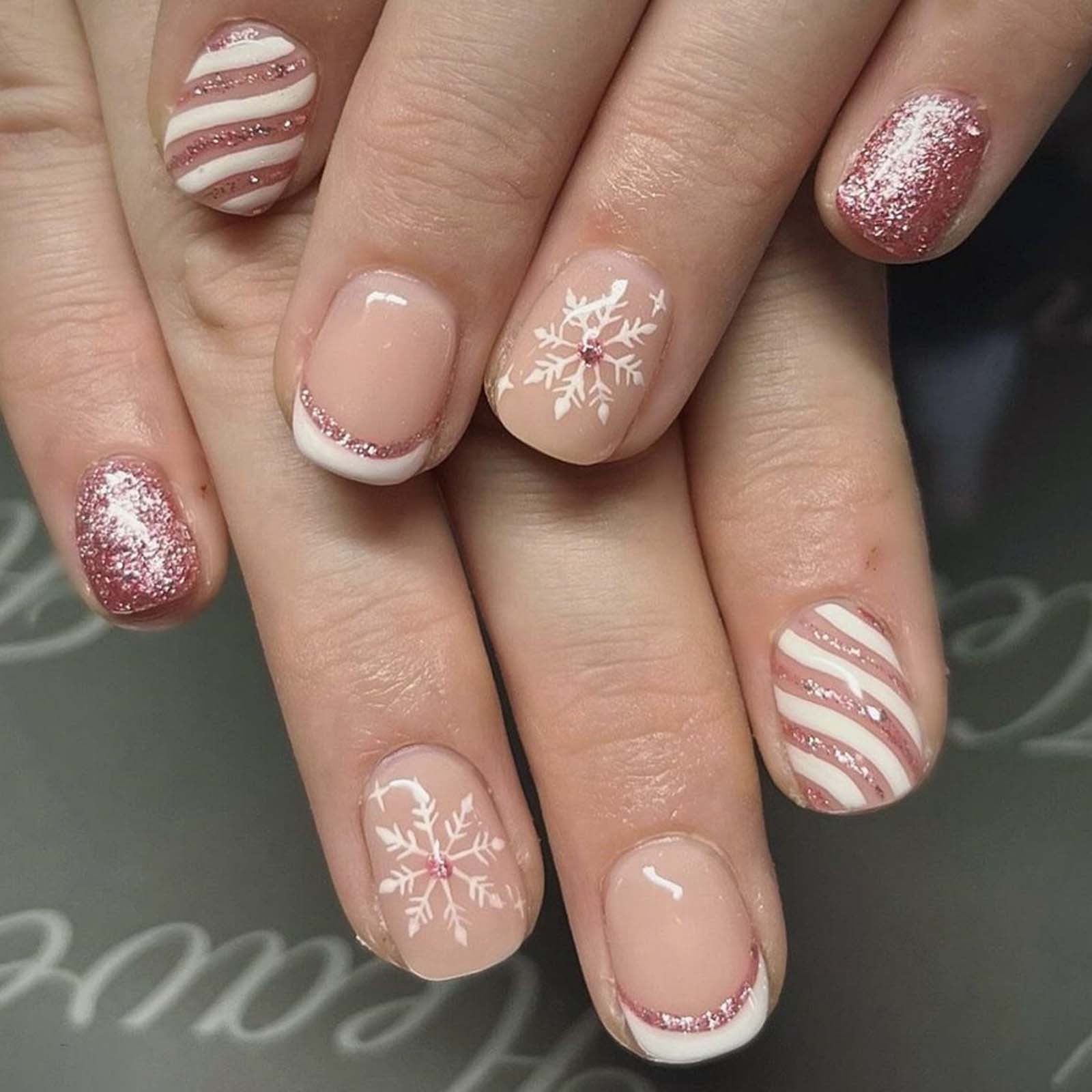 Nude French with Pink Glitter Snowflakes Nude French with Pink Glitter Snowflakes — Short Winter Acrylic Nails