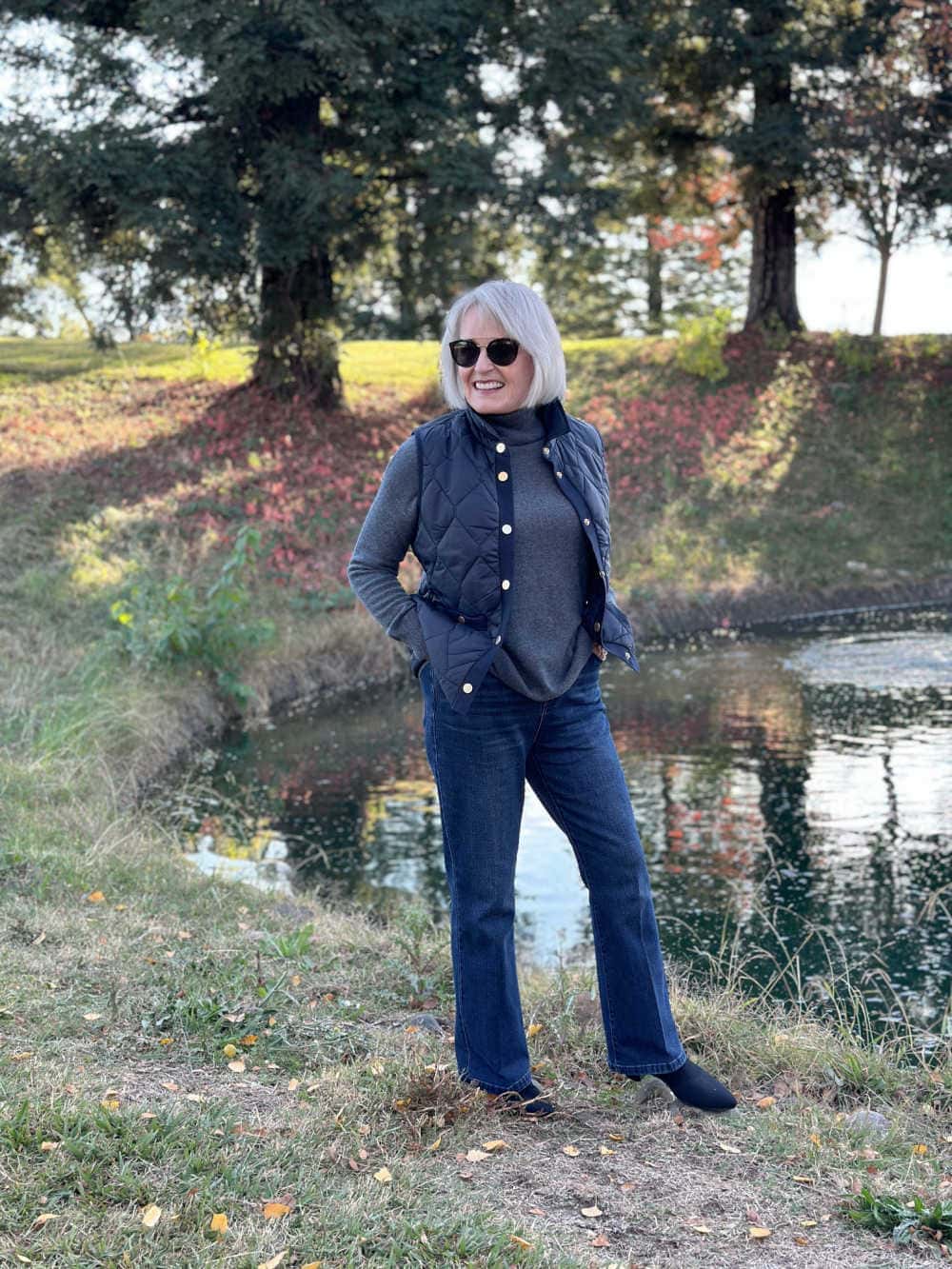Navy Puffer Vest Over Grey Turtleneck for Casual Outdoor Comfort Navy Puffer Vest Over Grey Turtleneck for Casual Outdoor Comfort — Winter Outfits for Women Over 60