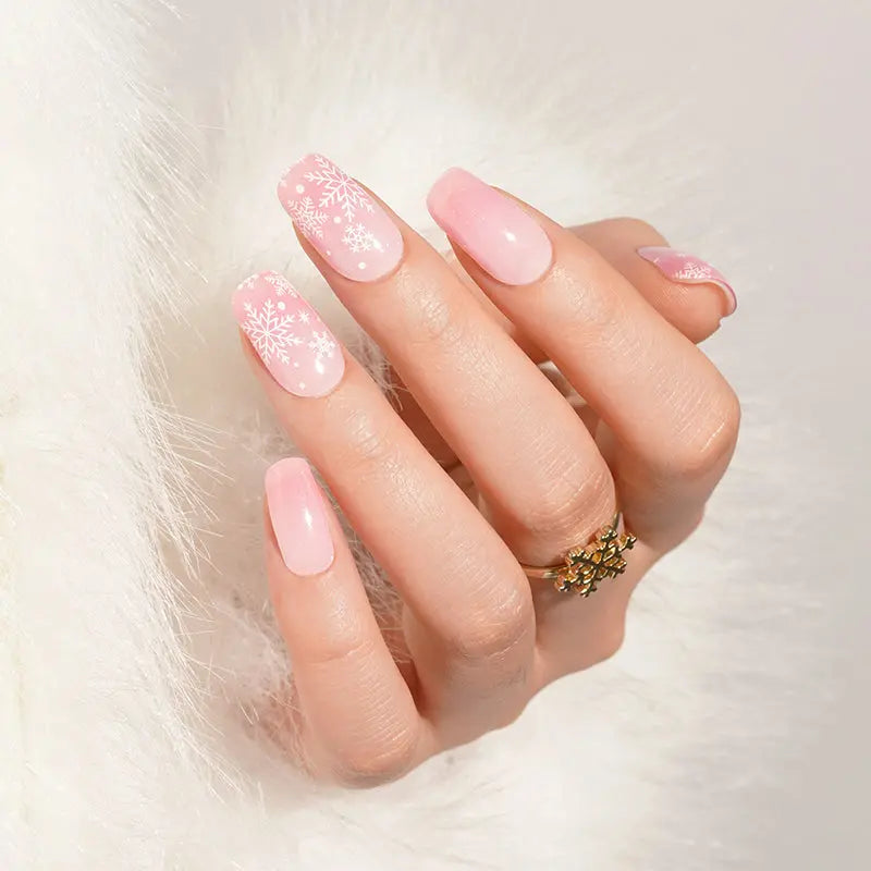 Pale Pink with Delicate White Snowflakes Pale Pink with Delicate White Snowflakes — Winter Wonderland Nails