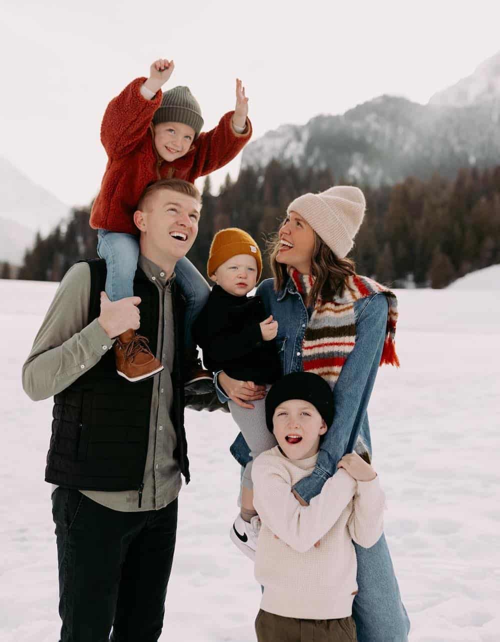 Layered Casual Winter Wear for a Joyful Family Photo Winter Family Photo Outfits