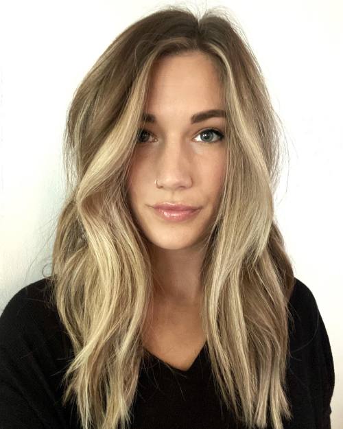 Collarbone Ash Blonde Voluminous Lob with Side-Swept Bangs Collarbone Ash Blonde Voluminous Lob with Side-Swept Bangs — Winter Haircuts for Oval Faces
