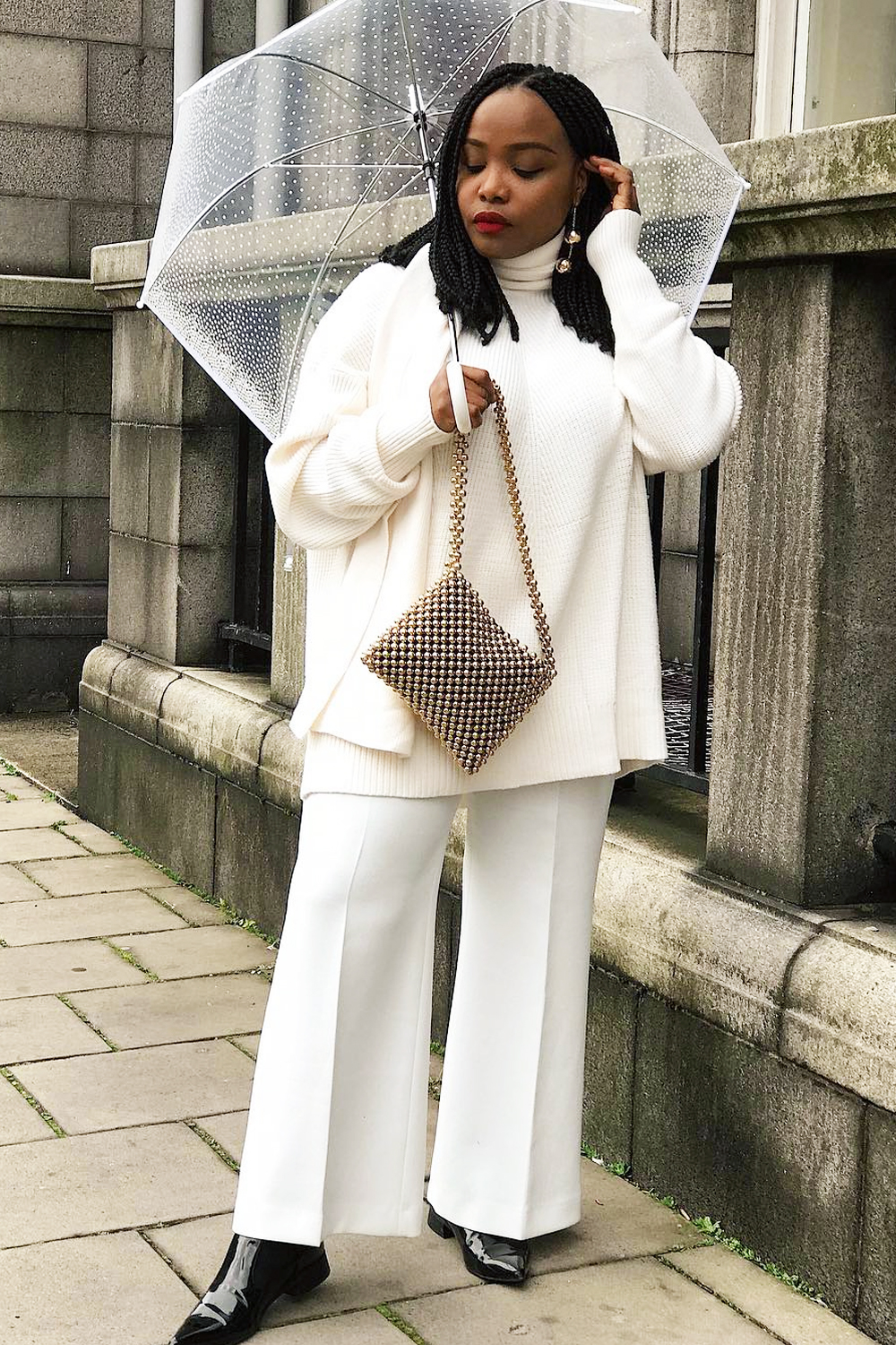 Ivory Turtleneck Sweater with White Wide-Leg Trousers and Black Boots — Winter White Outfits