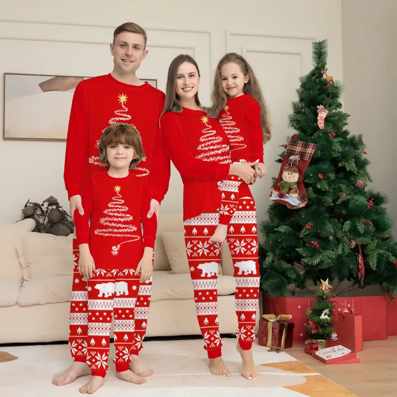 Family Photo Matching Red Pajamas with Christmas Prints for a Festive Family Family Photo Matching Red Pajamas with Christmas Prints for a Festive Family — Winter Family Photo Outfits