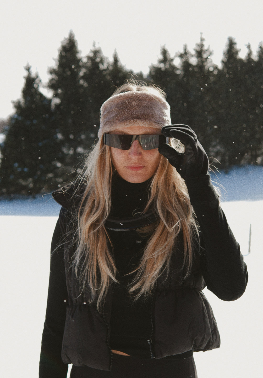 Sleek Black Turtleneck and Puffer Vest Combination Sleek Black Turtleneck and Puffer Vest Combination — Apres Ski Outfits