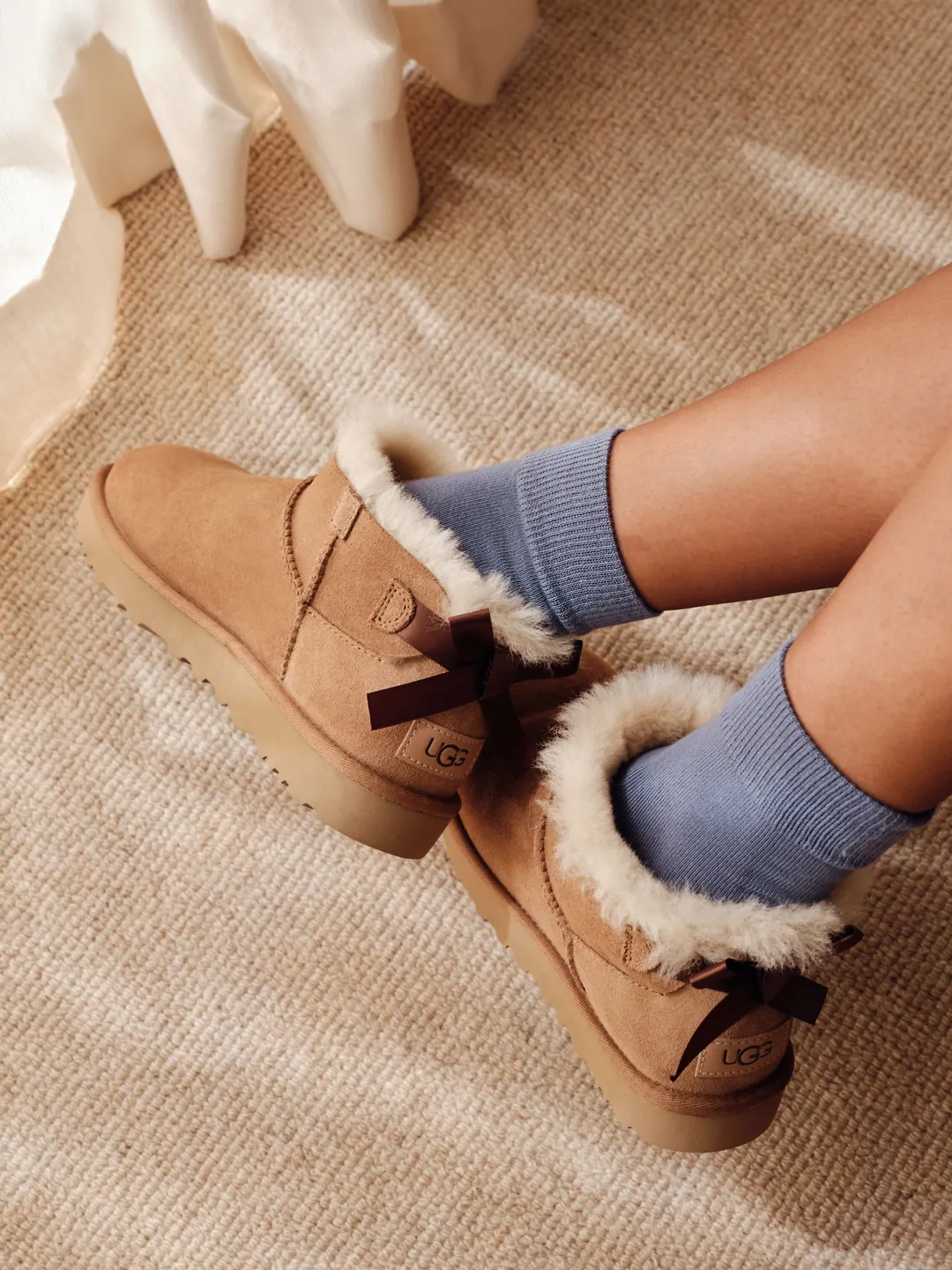 Chic Details: Bows and Shearling on Mini Ugg Boots Chic Details: Bows and Shearling on Mini Ugg Boots — Ugg Boots Outfits