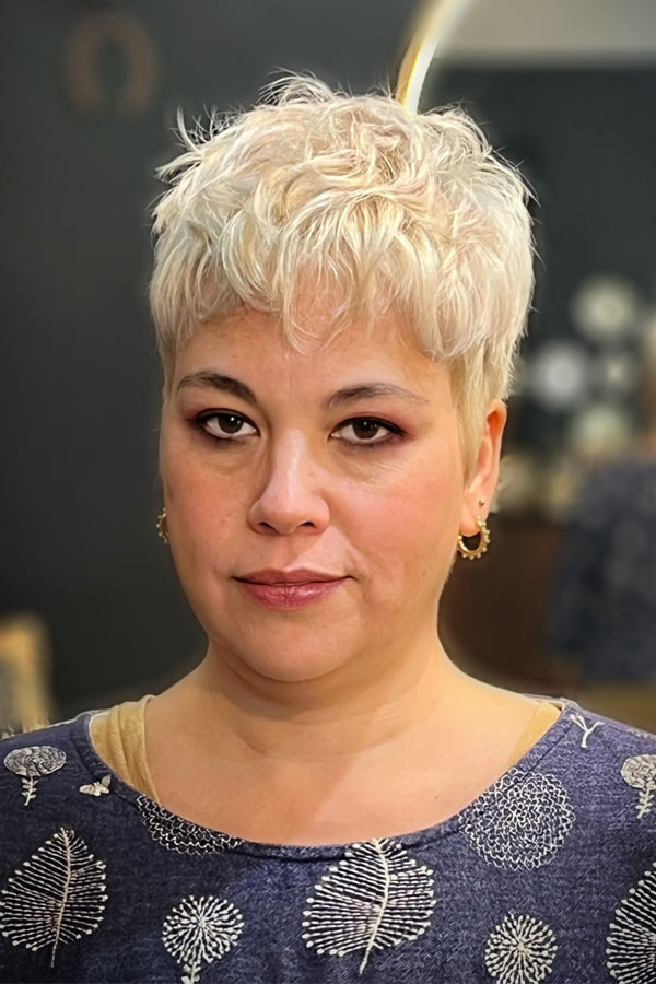 Textured Platinum Pixie with Layered Nape Textured Platinum Pixie with Layered Nape — very short women haircuts